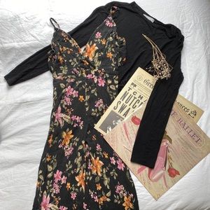 Black and floral jumper with leg slits